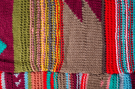Full frame take of knitted woolen patchwork