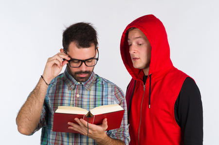 Two very different guys, a nerdy and a funky oneの写真素材