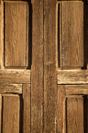 Detail take of the weathered planks of an old wooden doorの写真素材
