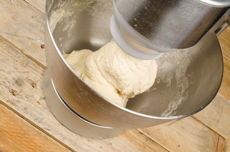 Kneading dough with a domestic food processorの写真素材