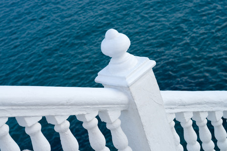White balustrade with ocean blue background, Mediterranean colorsの写真素材
