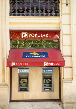 MADRID, SPAIN - FEBRUARY 12, 2015: A Banco Popular branch. Popular  is one of the medium sized Spanish banks repeatedly seen struggling during the financial turmoil in the eurozoneのeditorial素材