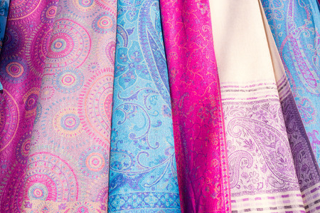 Full frame take of assorted headscarves on a street marketの写真素材