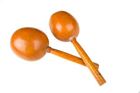 Pair of handmade maracas isolated on white