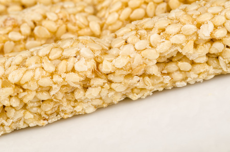 Closeup take of sesame bars isolated on whiteの写真素材