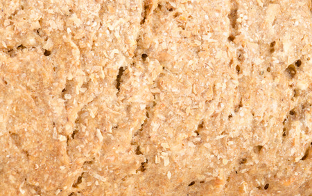 Full frame take of  the crust of a wholemeal breadの写真素材