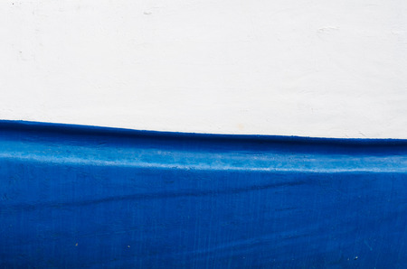 Wooden ship hull in Mediterranean blue and white colorsの写真素材