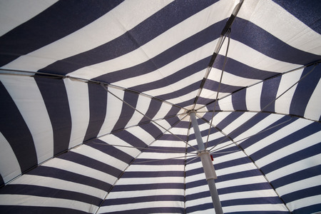 Full frame take of an open beach sunshadeの写真素材