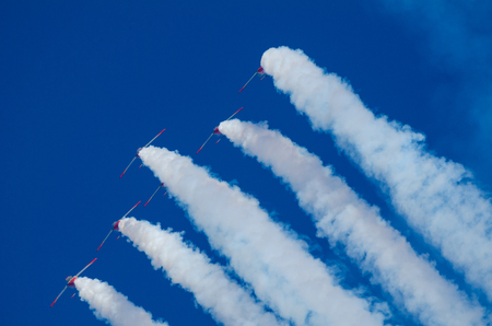 SAN JAVIER, SPAIN, OCTOBER18, 2015: Spanish military acrobatic squadron  Patrulla Aguila performing on their 30th anniversary celebrationのeditorial素材