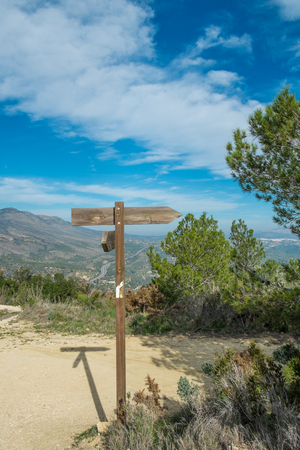 Wooden hiking signpost on a Costa Blanca moutain trail, Spainの写真素材