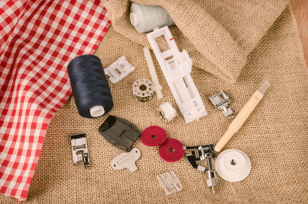 Sewing machine parts in a still life with yarn spoolsの写真素材