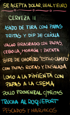 Chalkboard oustside a traditional Argentinian restaurantの写真素材