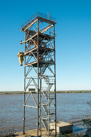Loading station for liquids on a river harbor bankの写真素材