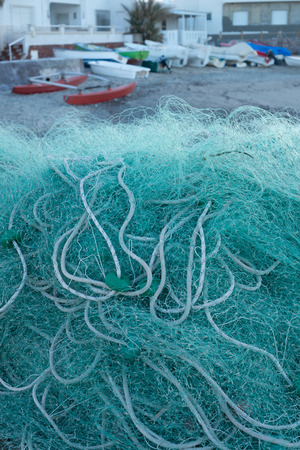Traditional fishing nets in a small harborの写真素材
