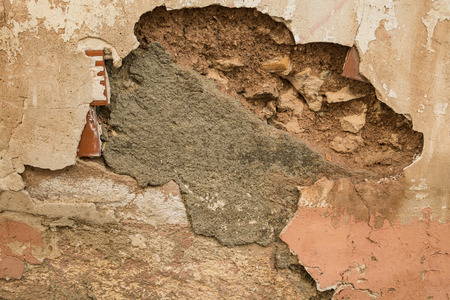 Detail take of a crumbling wall