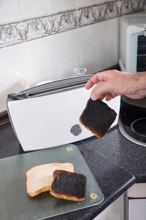 Toasting sandwich bread slices gone wrongの写真素材
