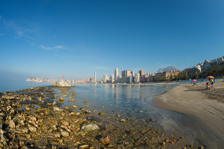 BENIDORM, SPAIN -JUNE 6, 2016: Tourists enjoying a sunny  day at the kickoff of high season on Spains largest beach resort.のeditorial素材