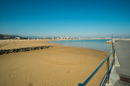 LAREDO, SANTANDER, SPAIN - AUGUST 14, 2016: Tourists enjoying a sunny  day  on Laredo resort beachのeditorial素材
