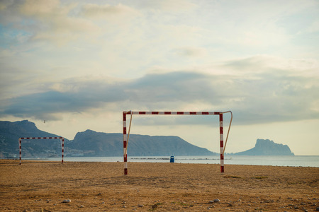 Beach soccer goals on calm Altea resort bay, Costa Blanca, Spainの写真素材