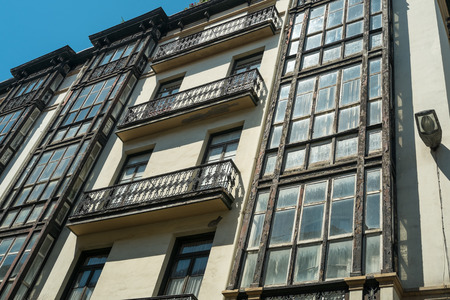 Wooden balconies on old town houses in Santander, Spain.の写真素材