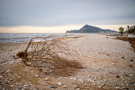 Heavy presence of floatsam after a storm on Altea beach, Spainの写真素材