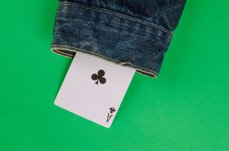 Card up the sleeve, a conceptual shot on cheating and dishonestyの写真素材
