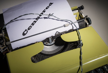 Old typewriter and text as a concept on the ever more threatened freedom of pressの写真素材