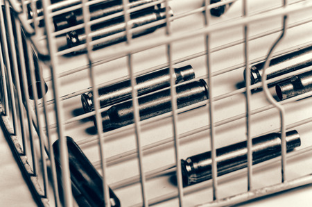 Bullets inside a cage, a concept on gun violence