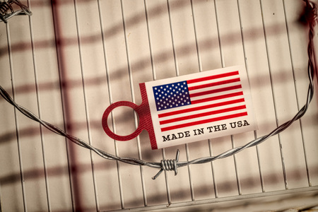 Barbed wire in a prison cell, a freedom of expression conceptの写真素材