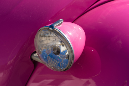 Detail take of a vintage car headlightの写真素材