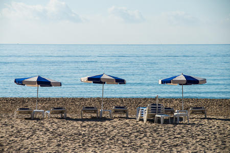 Early morning on a sunny Mediterranean beachの写真素材