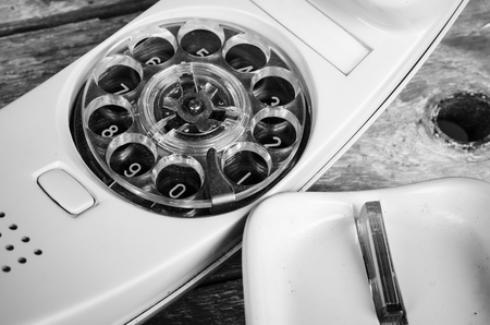 Old phone with its dial incorporated in the handsetの写真素材