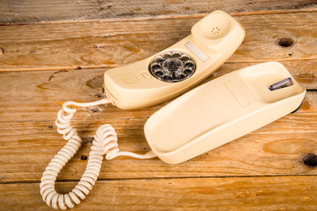 Old phone with its dial incorporated in the handsetの写真素材