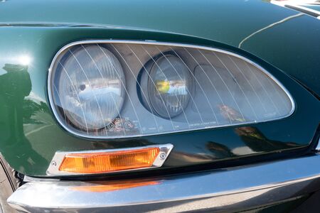 Headlight of a classic car. の写真素材