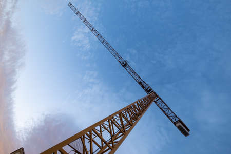 Construction crane in a low angle takeの写真素材