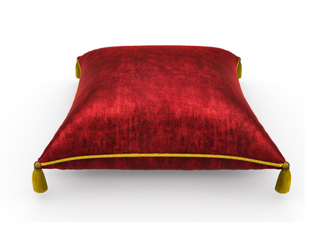 royal red velvet pillow on white backgroundの写真素材
