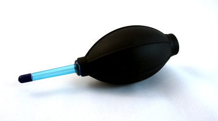 The air blower was used to gently blow any dirty or dust particles off and away from the lens.の写真素材