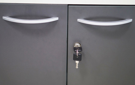 Black key locker used to store office documents.