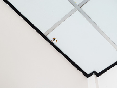 The bullet mark on the ceilings in the bedroom.の写真素材