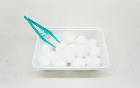 Green forceps and  cotton plastic containers were used in hospital.