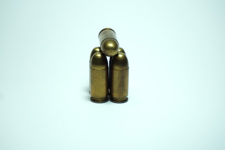11mm police bullets on white background