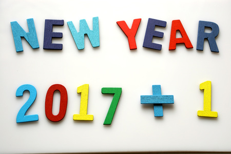New year 2018 made from Multicolored Alphabet letters  are lined on White background with empty space. Education or business concept.の写真素材
