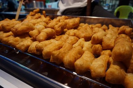 Chinese fried stick made for sell in the night market of Surat thani,the province of Thailand