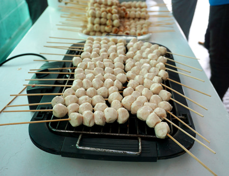 Grill pork balls on the electric stove                           