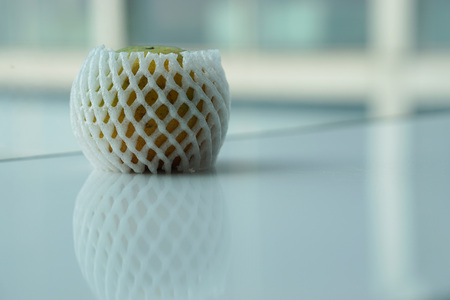 Tangerine with white foam protection net, background and texture concept.                        の写真素材