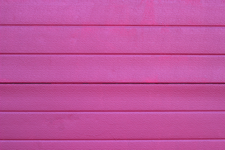Pink plastic background, pink plastic texture, materialの写真素材