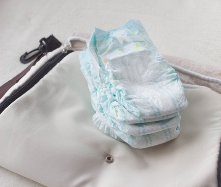 Baby diapers lie on the bag, diapers with you on the road, cleanの写真素材