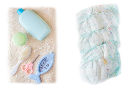 Baby diapers, comb towel and cream after bathing, white background, toothbrush,の写真素材