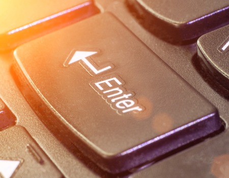 Button enter on the keyboard, macro, fingerboard and keysの写真素材