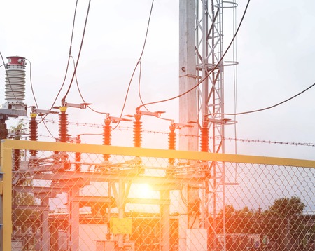Power transformer in high voltage switchyard in modern electric substation, power, danger